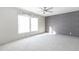 Spacious bedroom with large window and ceiling fan at 120 Wilder Rd, Saint Stephen, SC 29479