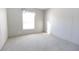 Cozy bedroom with a window and plush carpet at 120 Wilder Rd, Saint Stephen, SC 29479