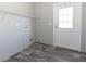 Laundry room with built-in shelving and exterior access at 120 Wilder Rd, Saint Stephen, SC 29479