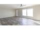 Spacious living room with wood-look floors and a ceiling fan at 120 Wilder Rd, Saint Stephen, SC 29479