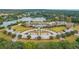 Aerial view of community clubhouse, pool, and parking at 1248 Creek Watch Trce, Seabrook Island, SC 29455