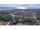 Wide aerial showcasing waterfront homes and marsh views at 1248 Creek Watch Trce, Seabrook Island, SC 29455