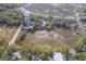 Aerial view of waterfront property with lush greenery at 1248 Creek Watch Trce, Seabrook Island, SC 29455