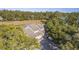 Aerial view of a charming home nestled amongst trees at 1248 Creek Watch Trce, Seabrook Island, SC 29455