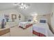Bedroom with two twin beds, light walls, and a ceiling fan at 1248 Creek Watch Trce, Seabrook Island, SC 29455