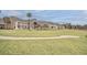 Community clubhouse surrounded by lush green lawn at 1248 Creek Watch Trce, Seabrook Island, SC 29455