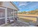 Deck with wicker chairs and marsh views at 1248 Creek Watch Trce, Seabrook Island, SC 29455