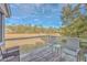 Enjoy outdoor seating on this deck overlooking tranquil marsh scenery at 1248 Creek Watch Trce, Seabrook Island, SC 29455