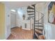 Entryway with spiral staircase leading to upper level at 1248 Creek Watch Trce, Seabrook Island, SC 29455