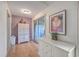 White hallway with built-in storage and access to patio at 1248 Creek Watch Trce, Seabrook Island, SC 29455