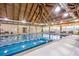 Indoor lap pool with high ceilings and natural light at 1248 Creek Watch Trce, Seabrook Island, SC 29455