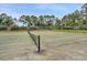 Two tennis courts with a net and surrounding fencing at 1300 Park West Blvd # 1109, Mount Pleasant, SC 29466