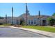 Community center with landscaping and palm trees at 1300 Park West Blvd # 417, Mount Pleasant, SC 29466