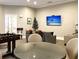 Community room with seating, foosball, and a large TV at 1300 Park West Blvd # 417, Mount Pleasant, SC 29466