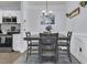 Small dining area with built in bar and wine cooler at 1300 Park West Blvd # 417, Mount Pleasant, SC 29466