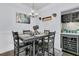 Charming dining area with built-in bar and wine cooler at 1300 Park West Blvd # 417, Mount Pleasant, SC 29466