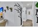 Inviting entryway with unique wall art and wood floors at 1300 Park West Blvd # 417, Mount Pleasant, SC 29466