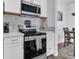 Stainless steel appliances and white cabinetry at 1300 Park West Blvd # 417, Mount Pleasant, SC 29466