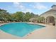 Resort-style pool with surrounding lounge chairs at 1300 Park West Blvd # 417, Mount Pleasant, SC 29466