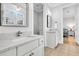 Modern bathroom with white cabinets, quartz countertops, and a toilet at 136 Fairbanks Oak Aly # 2A, Charleston, SC 29492