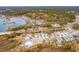 Aerial view of a waterfront neighborhood at 141 Low Tide Ct, Charleston, SC 29492