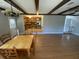 Light-filled dining area with hardwood floors and kitchen view at 148 Ponderosa Dr, Ladson, SC 29456