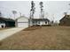 House exterior featuring a two-car garage and landscaping at 148 Ponderosa Dr, Ladson, SC 29456