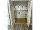 Laundry closet with built-in shelving and vinyl flooring at 148 Ponderosa Dr, Ladson, SC 29456