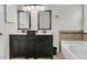 Bathroom with double vanity, bathtub, and tile flooring at 151 Belleplaine Dr, Goose Creek, SC 29445