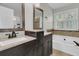 Bathroom featuring double vanity and soaking tub at 151 Belleplaine Dr, Goose Creek, SC 29445