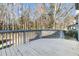 Wooden deck overlooks backyard with wooded area at 151 Belleplaine Dr, Goose Creek, SC 29445
