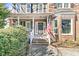 Brick home with a front porch and American flag at 151 Belleplaine Dr, Goose Creek, SC 29445