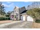 Two-story home with two-car garage and American flag at 151 Belleplaine Dr, Goose Creek, SC 29445