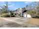 Two-story home with a two-car garage and landscaped yard at 151 Belleplaine Dr, Goose Creek, SC 29445