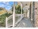 Spacious front porch with white railings and wooden floors at 151 Belleplaine Dr, Goose Creek, SC 29445