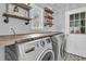 Laundry room with washer, dryer and custom wooden countertop at 151 Belleplaine Dr, Goose Creek, SC 29445