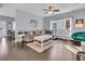Spacious living room with hardwood floors and comfy seating at 151 Belleplaine Dr, Goose Creek, SC 29445