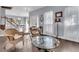 Relaxing sitting area with wicker chairs and hardwood floors at 151 Belleplaine Dr, Goose Creek, SC 29445