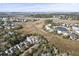 Wide aerial view of a neighborhood near the water at 155 Bounty St, Charleston, SC 29492