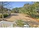 Landscaped backyard with seating area at 155 Bounty St, Charleston, SC 29492