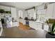 Modern kitchen with white cabinets, stainless steel appliances, and hardwood floors at 155 Bounty St, Charleston, SC 29492