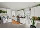 Spacious kitchen with white cabinets, stainless steel appliances, and granite countertops at 155 Bounty St, Charleston, SC 29492