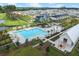 Aerial view of community pool, cabanas, and surrounding homes at 157 Pocket Bend Cir # B, Summerville, SC 29486