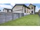 Artificial turf backyard with gray fence and gate at 157 Pocket Bend Cir # B, Summerville, SC 29486