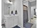 Clean bathroom with white vanity, shower, and gray accents at 157 Pocket Bend Cir # B, Summerville, SC 29486