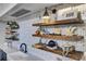 Well-equipped community kitchen with open shelving and a geometric backsplash at 157 Pocket Bend Cir # B, Summerville, SC 29486