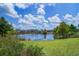 Scenic pond reflecting houses and landscaping at 157 Pocket Bend Cir # B, Summerville, SC 29486