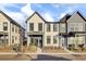 Cream and gray two-story townhouses with front porches and landscaping at 157 Pocket Bend Cir # B, Summerville, SC 29486