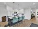 Open concept kitchen island with seating and stainless steel appliances at 157 Pocket Bend Cir # B, Summerville, SC 29486