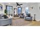 Relaxing living room with gray armchairs and a patterned rug at 157 Pocket Bend Cir # B, Summerville, SC 29486